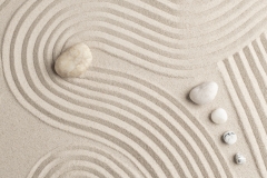 Zen marble stones sand background in peace concept